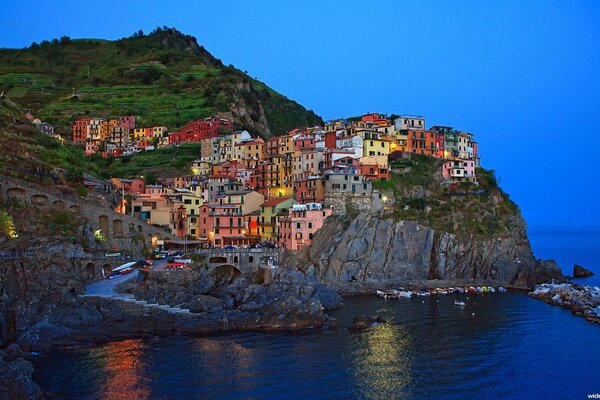 Multicolored houses of Italy on the rocks