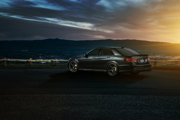 Mercedes-benz car on the background of the urban landscape