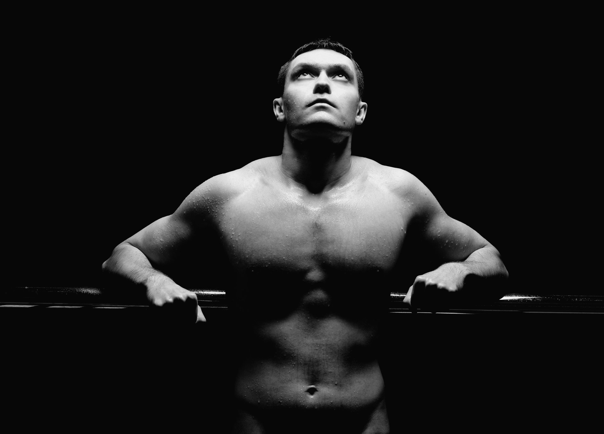 male bw muscles jock look torso background look up black background hands shoulders body