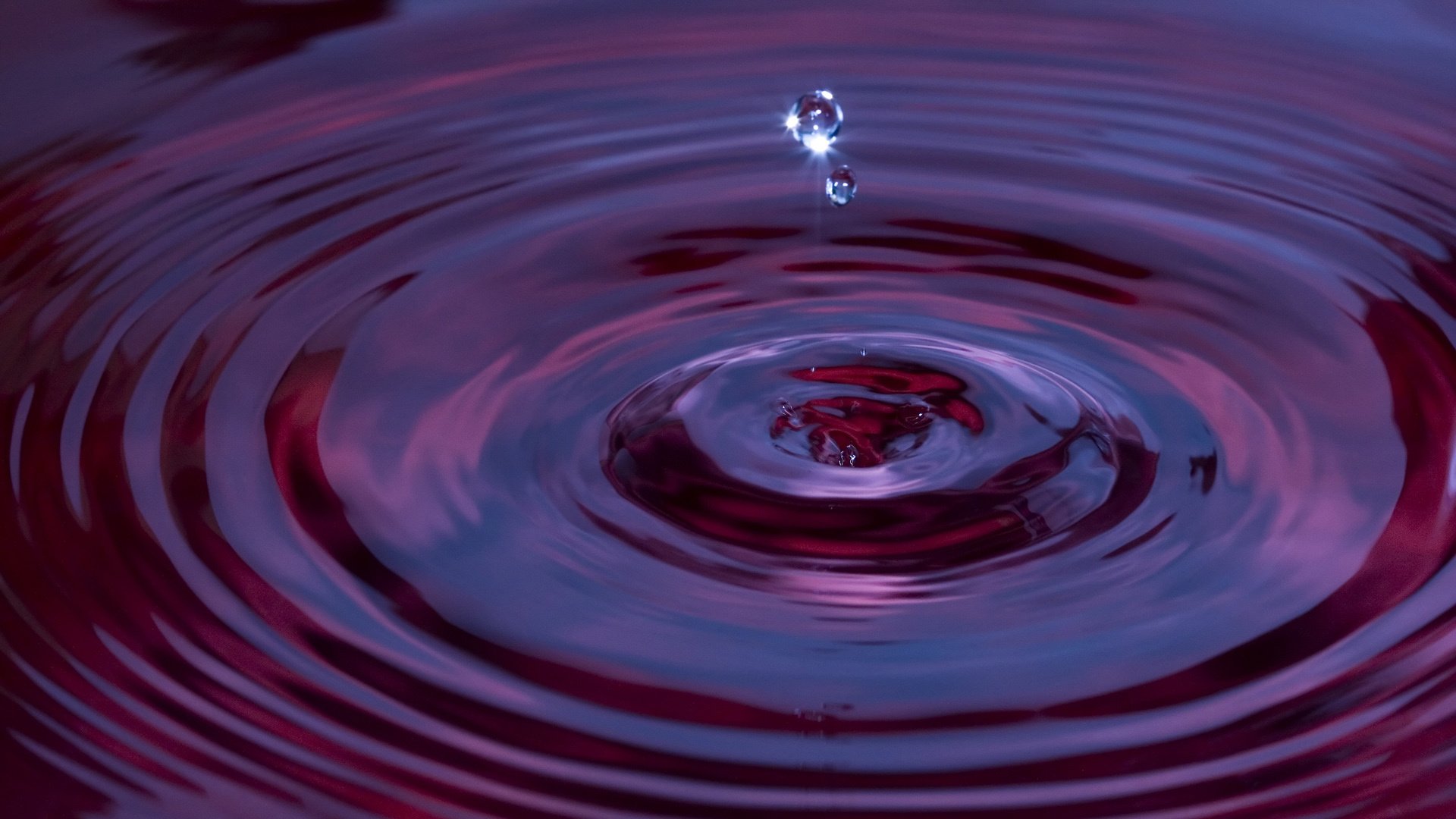 eau goutte cercles macro paillettes rouge vagues