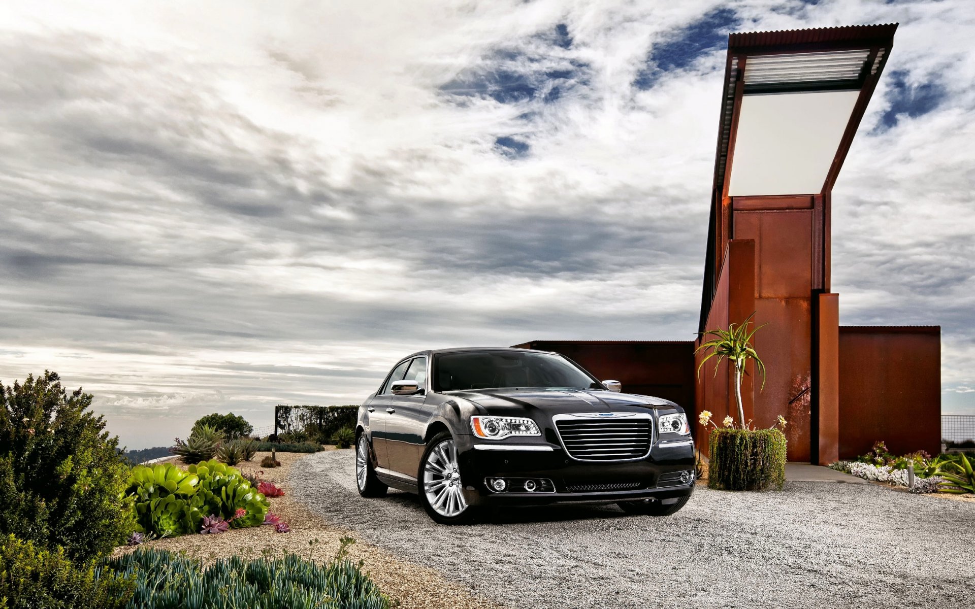 chrysler car black sedan sky building front machine