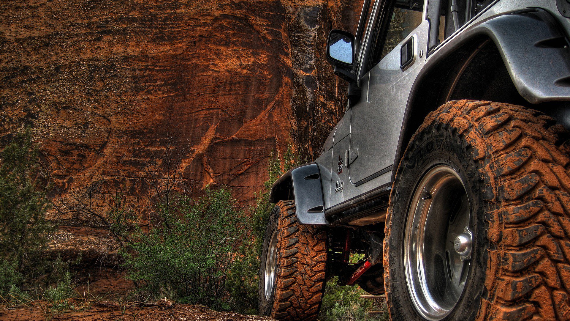 jeep räder sand berge felsen