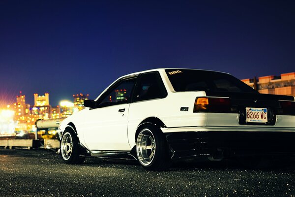 Old Toyota Corolla white car