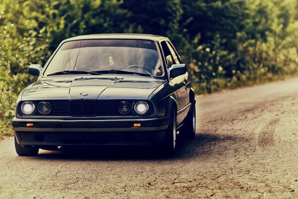 Bmw e30 on a country road