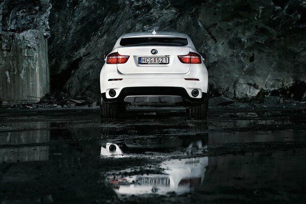 White BMW car on a gray background