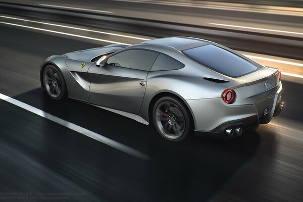 Ferrari berlinetta de plata en movimiento