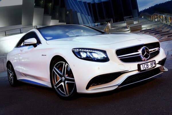 Beautiful white Mercedes-Benz Coupe car