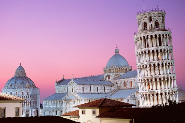 Leaning Tower of Pisa against a pink sky