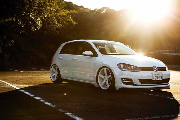 White Volkswagen polo in the sun