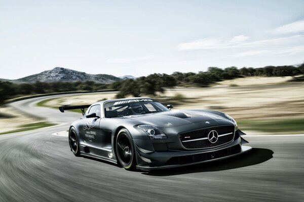 Silver private Mercedes Benz on the highway