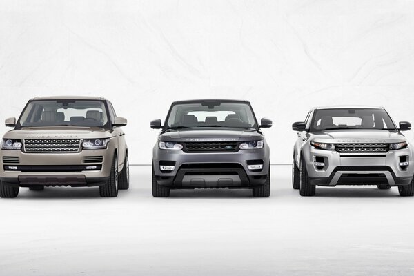 SUVs in a row on a white background