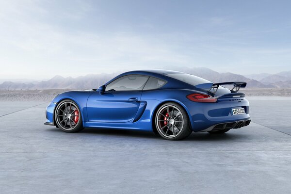 Blue Porsche on a blue sky background