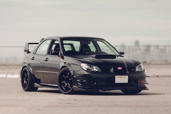 Subaru black car