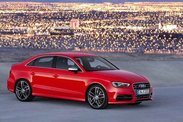 Sur fond de feux de ville rouge Berline audi a3