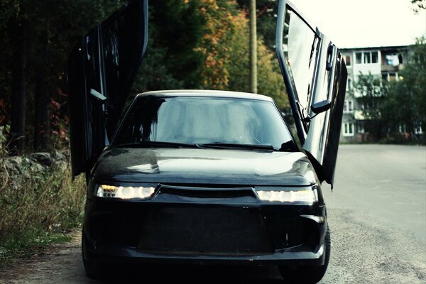 Black VAZ 2112 with narrow headlights