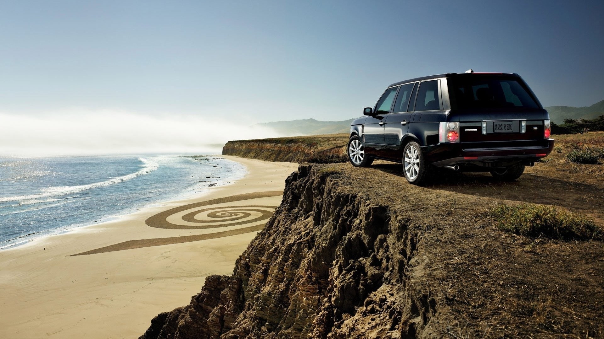 sabbia auto asiatica roccia spiaggia