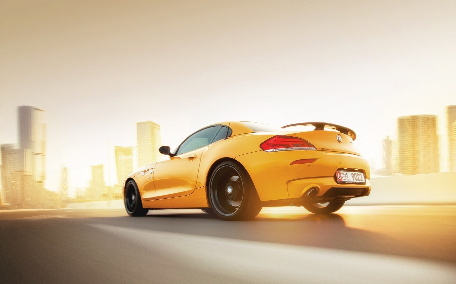 bmw z4 jaune voiture coucher de soleil vitesse arrière