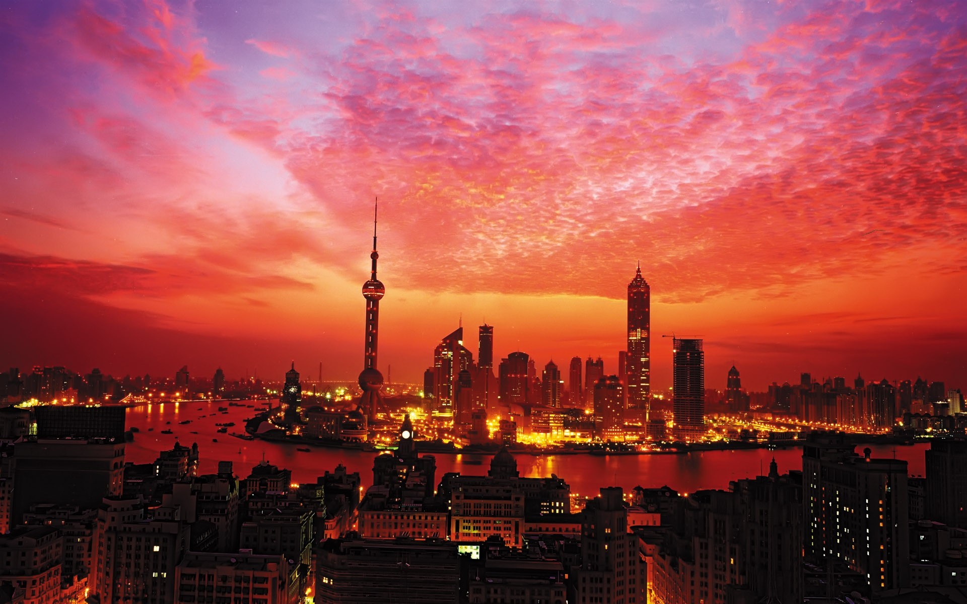 gratte-ciel shanghai tour coucher de soleil lumières