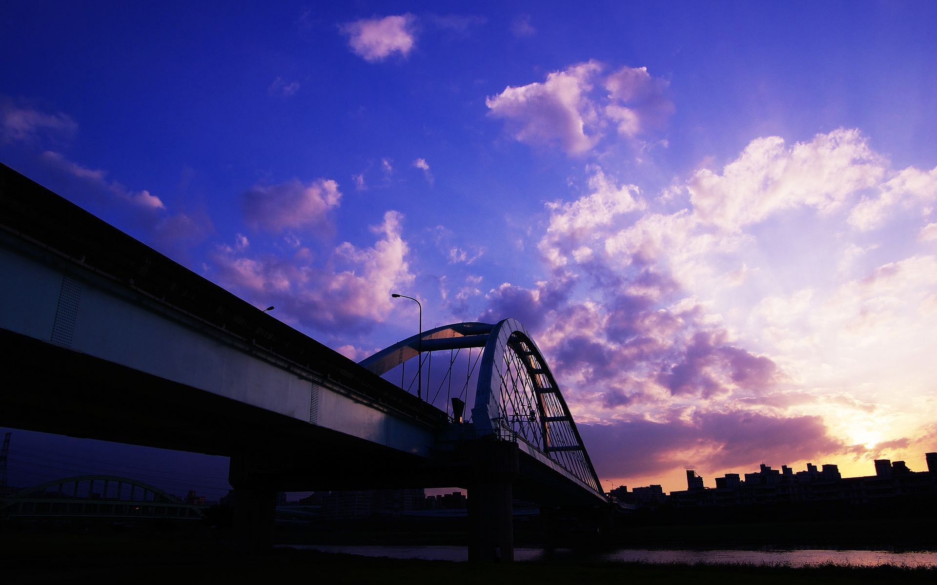 bridge house clouds sunset