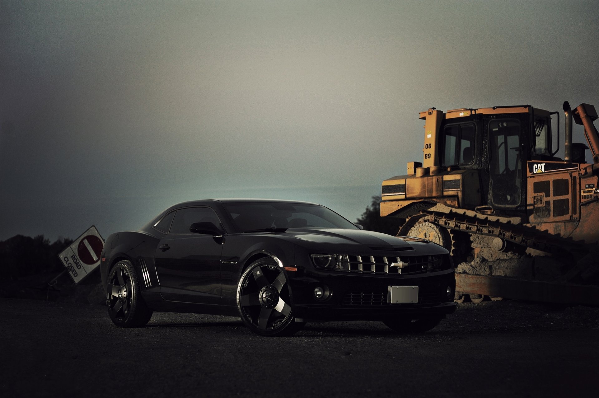 chevrolet camaro ss black tracks yellow chevrolet camaro bulldozer caterpillar