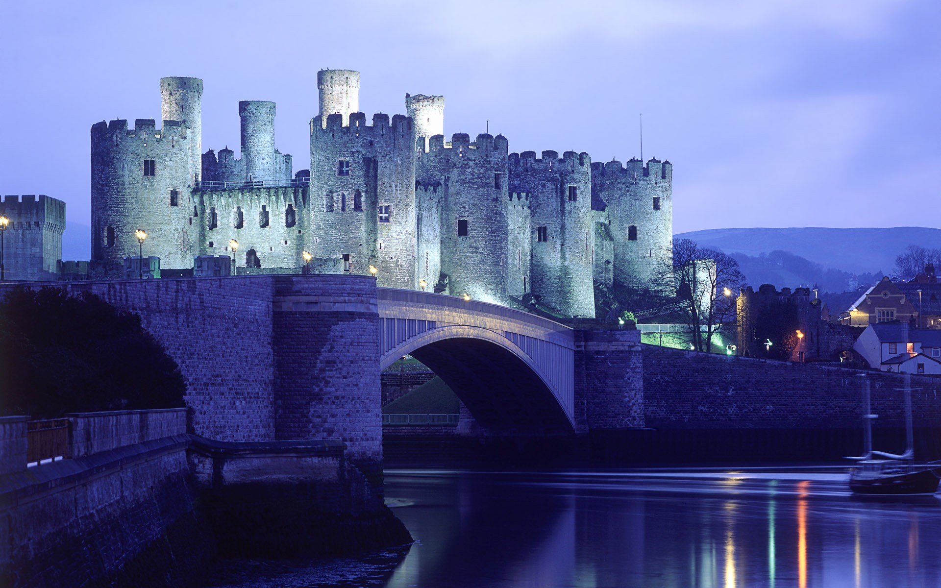 castle night lights water bridge