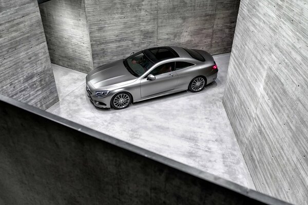 Grey car indoors