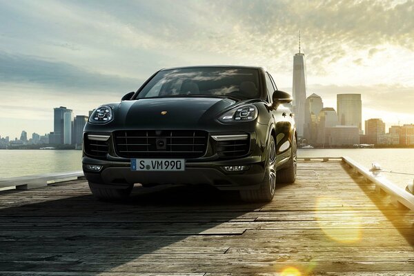 Luxury car on the city pier