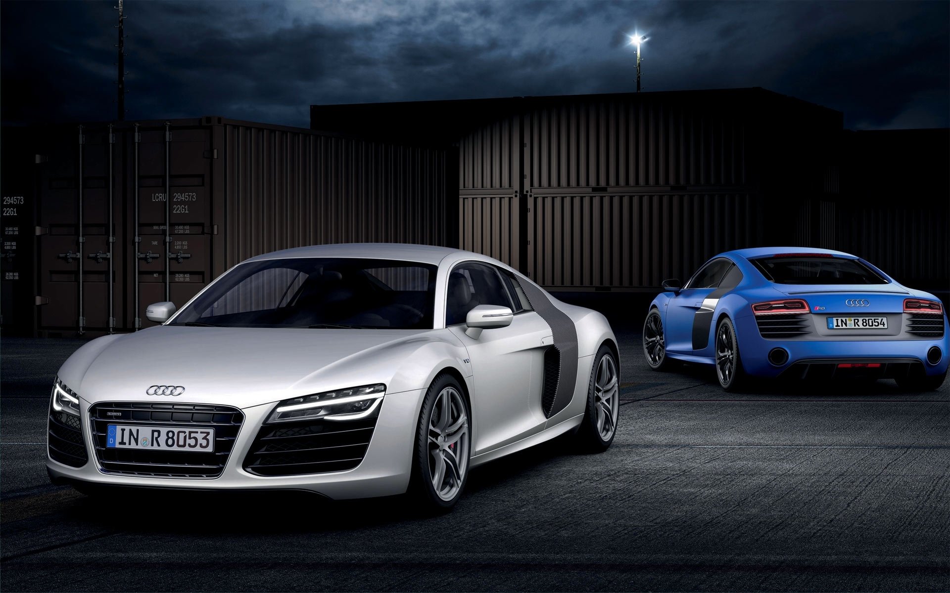 audi r8 v10 plusx sports car two blue white containers night