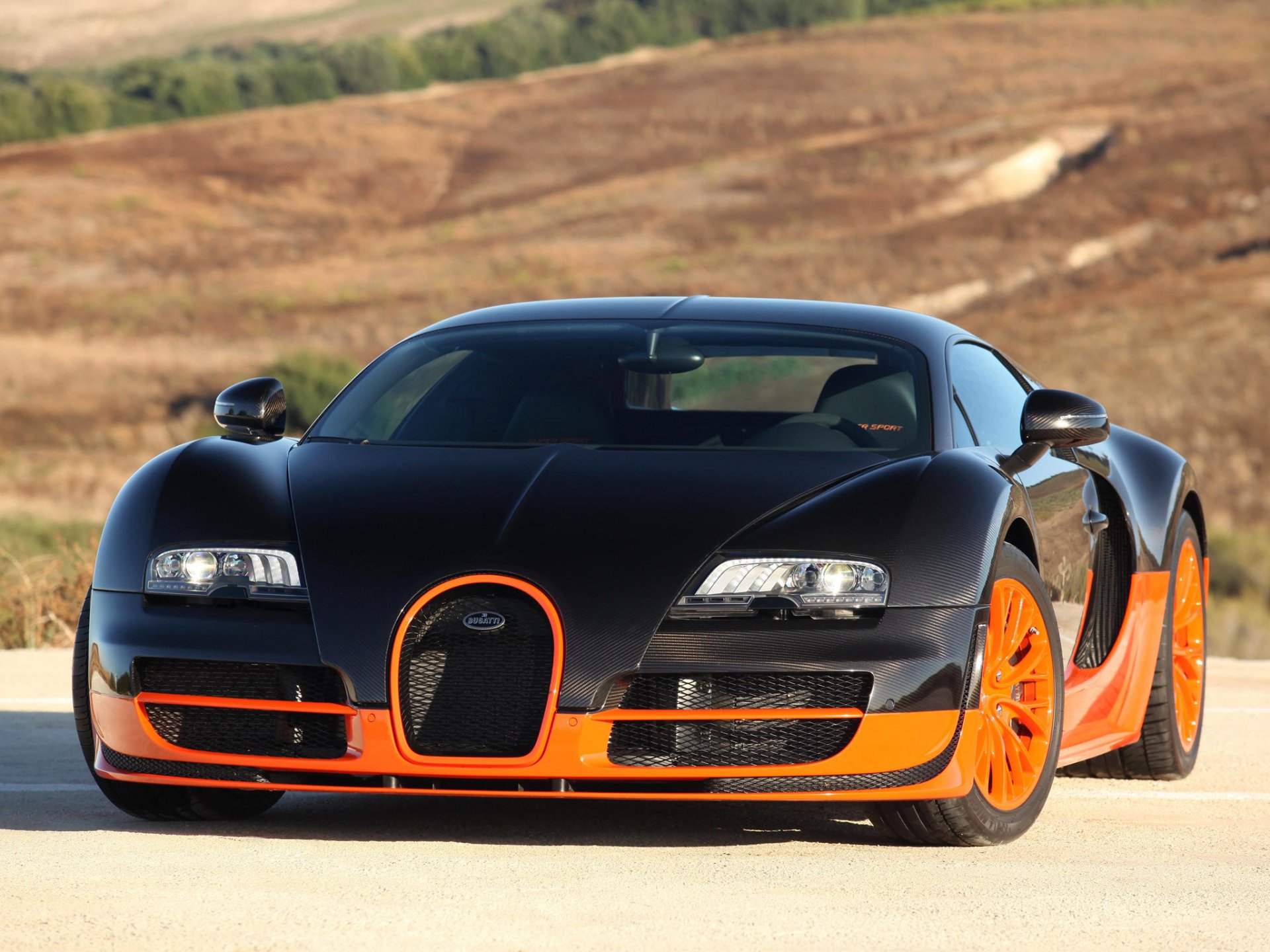 bugatti veyron 16.4 super sport szybki supersamochód hypercar czarny pomarańczowy