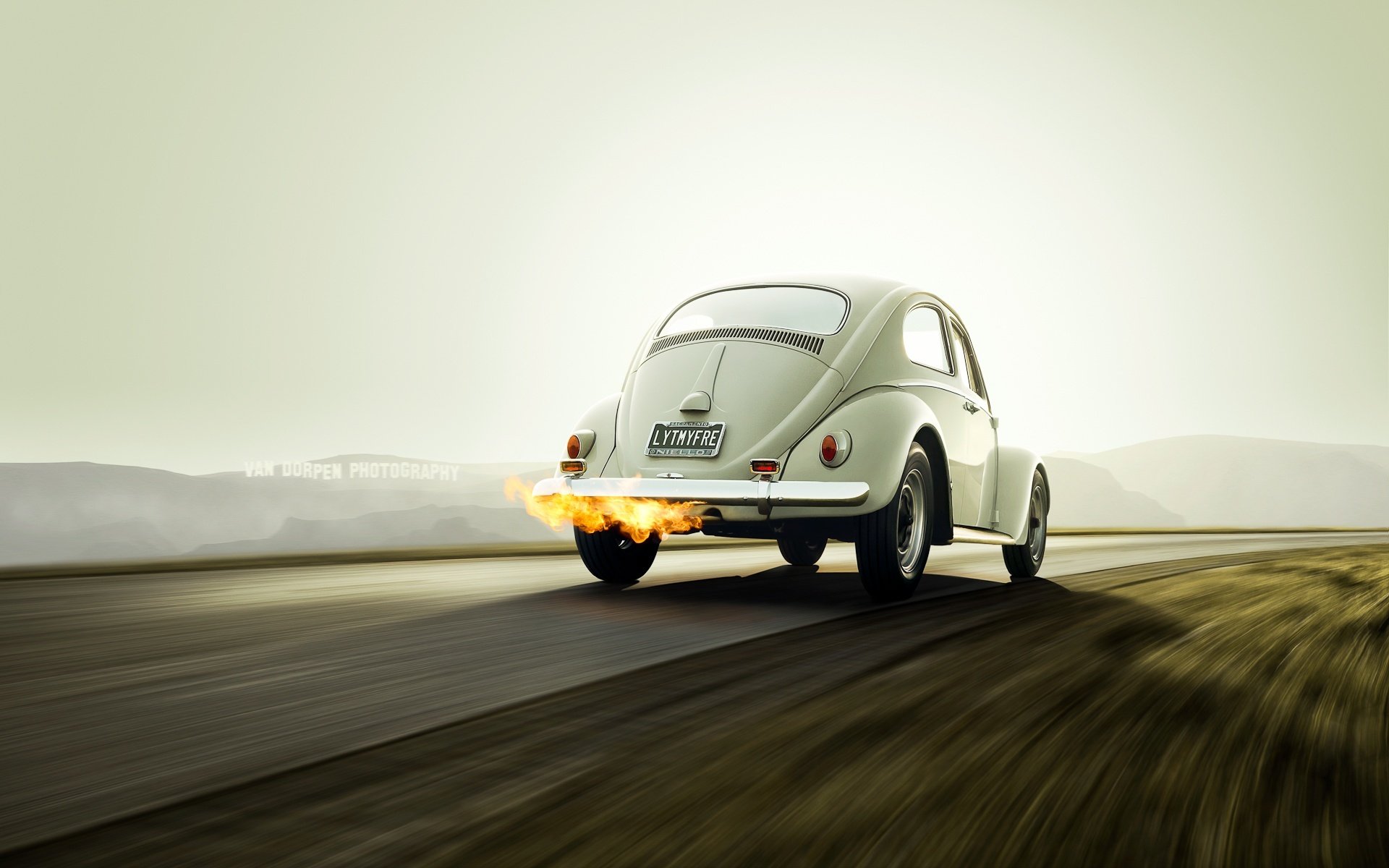 volkswagen beetle white fire rear volkswagen exhaust. flame movement