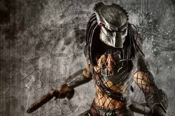 Predator z filmu z bronią w ręku