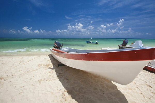 Sea boat on the river coast