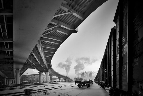 Black and white photo of the winter railway