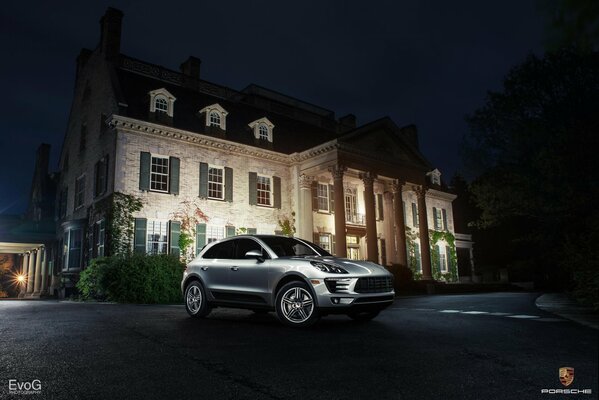 Silver Porsche in the dark