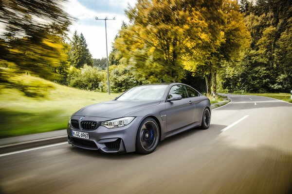 Bmw in motion on the main road