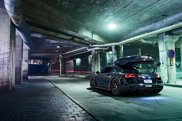 Black car in underground parking