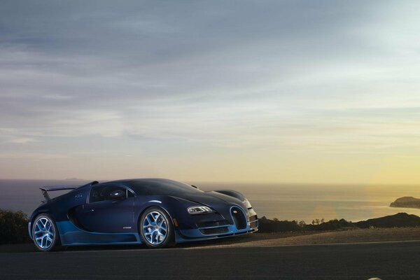 Bugatti azul en el fondo del mar al atardecer