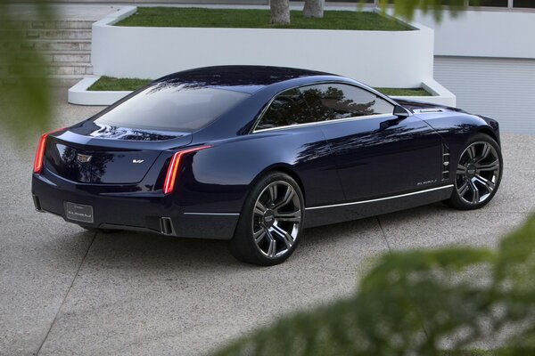 Black cadillac coupe at home