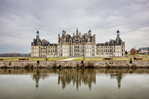 A grey castle under a grey sky