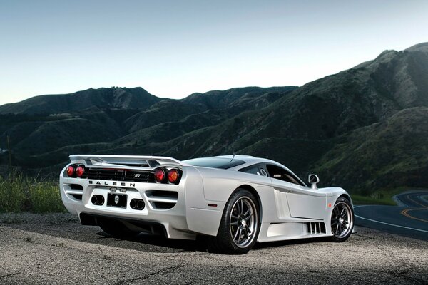 Silver car near the mountains