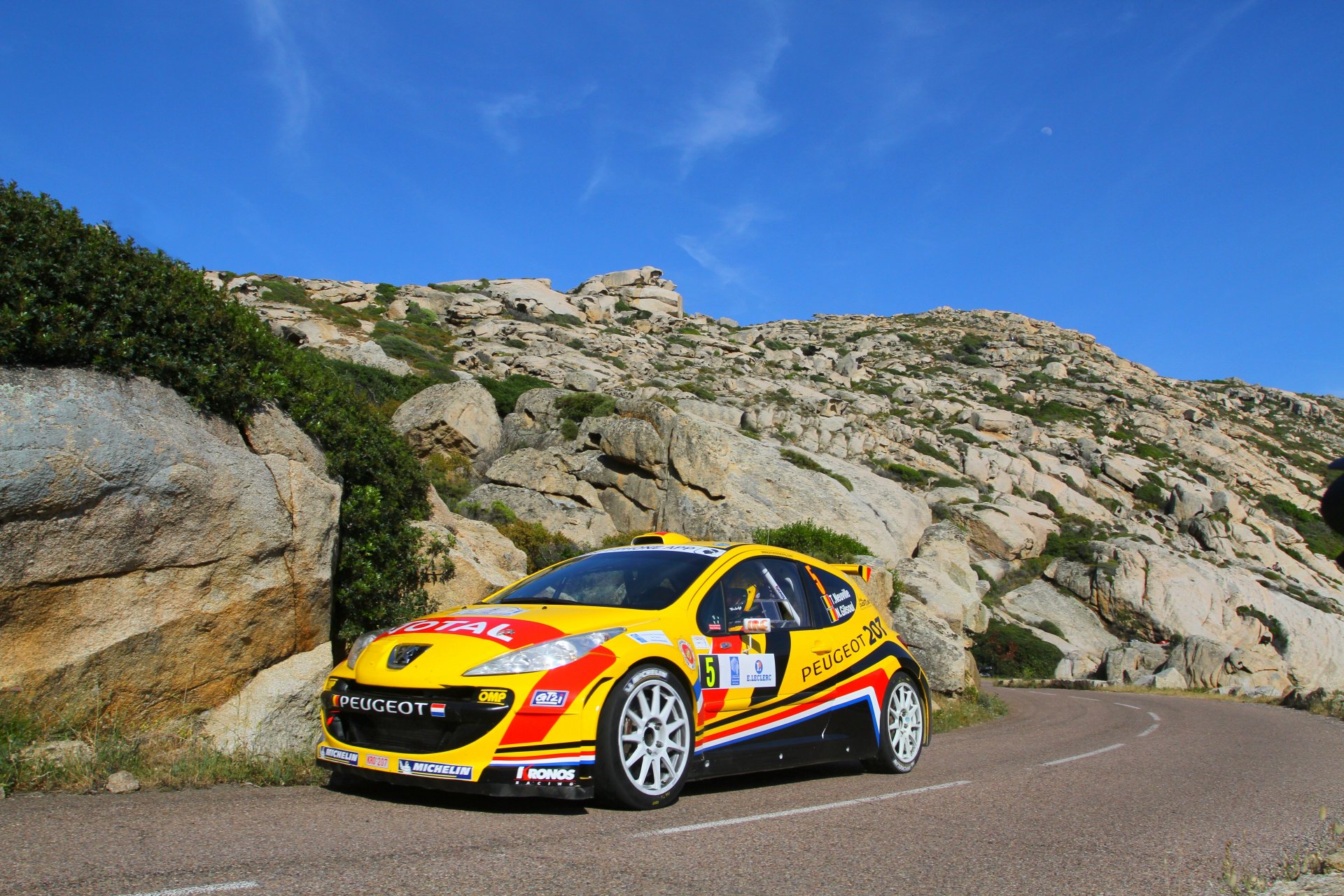 peugeot rally wrc rally yellow rocks day front sport