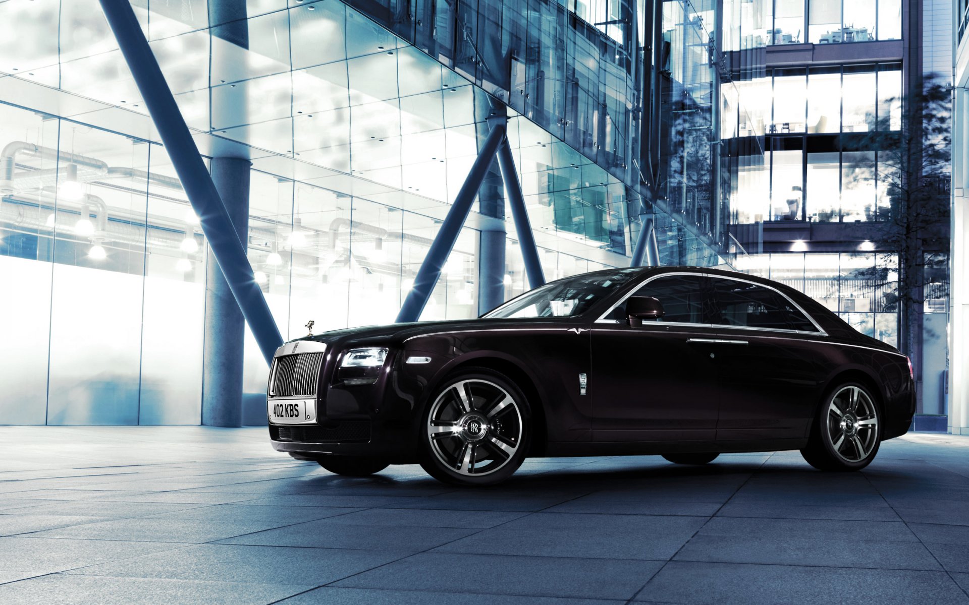 rolls royce ghost v-specification car machine a side view night town