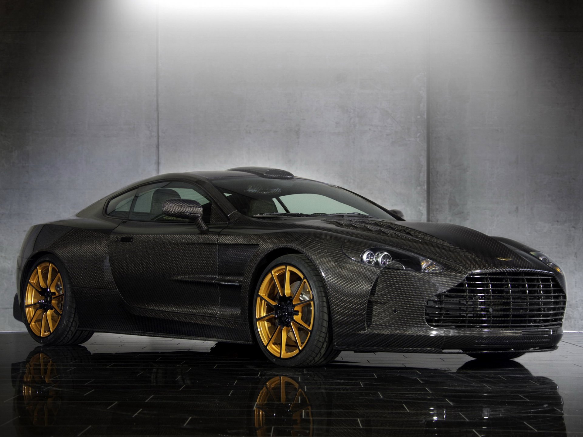 mansory cyrus aston martin db9 hintergrund auto carbon front