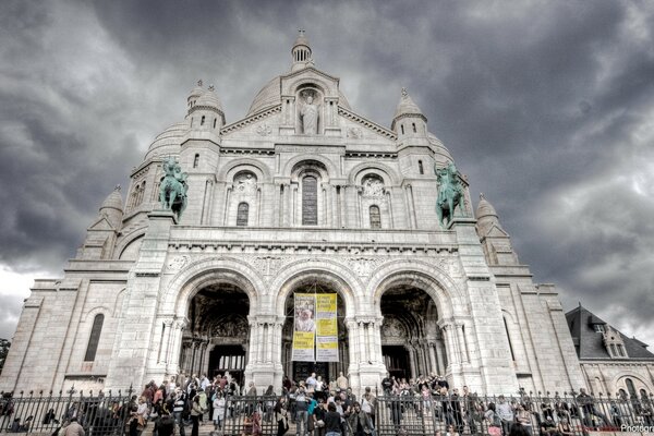 A monumental building under a dark sky