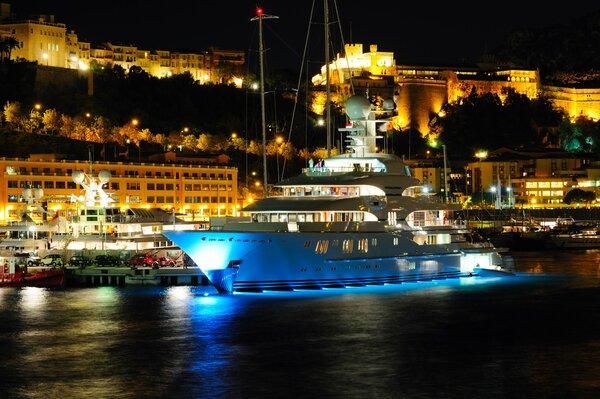 White yacht on the background of the evening Monte Carlo