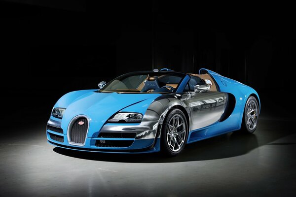 Auto bugatti veyron blu su sfondo scuro