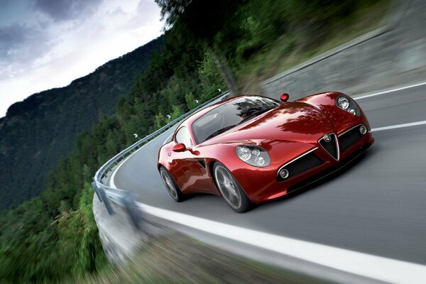 Red alfa Romeo 8c on a mountain road background