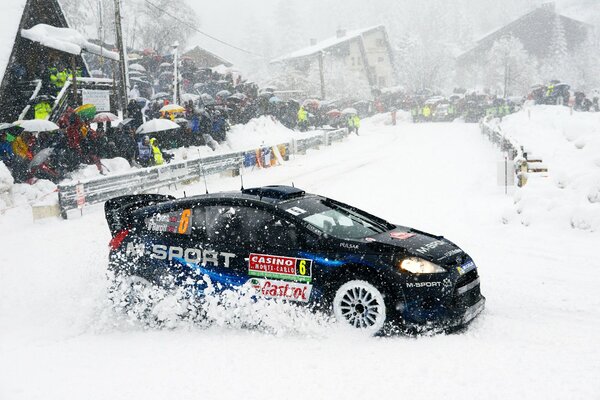 Snowy winter with a moving car