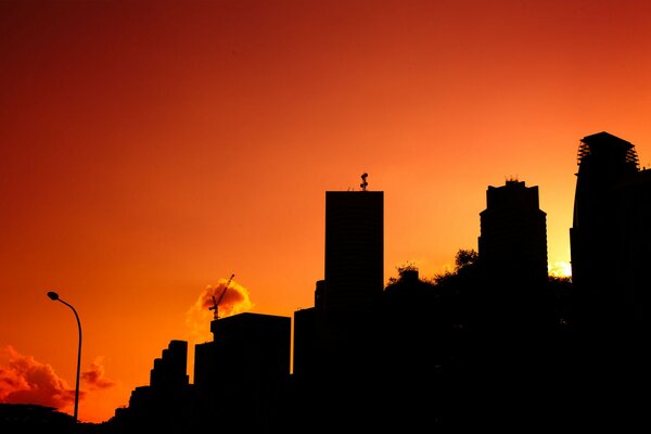 Sunset over the city beckons the eye