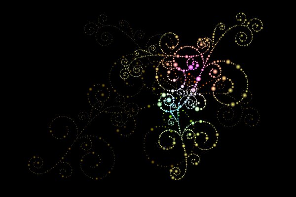 Sparkling pattern with swirls on a black background